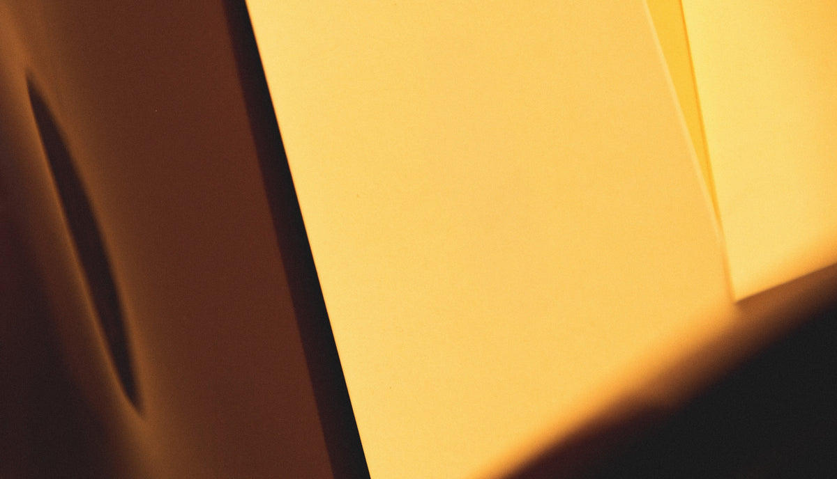 Warm abstract light study in amber and gold.